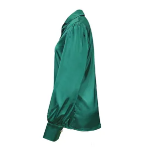 Side view of a dark green satin shirt featuring elegant lantern sleeves and a loose fit.