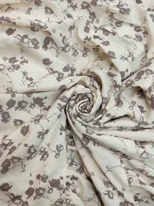 Macro detail of the elegant floral print fabric for a bohemian spring V-neck dress