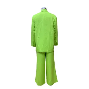 Detailed back view of a trendy neon lime green long-sleeve blazer and wide-leg trousers set