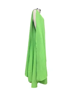 Side view detail of a lime green one-shoulder sleeveless floor-length banquet gown.