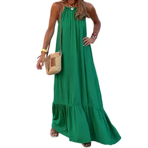 Close-up of a green sleeveless halter maxi dress for beach and casual summer wear.