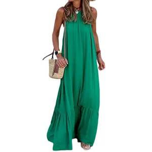 Elegant sleeveless halter-neck maxi dress in vibrant green perfect for summer beach holidays