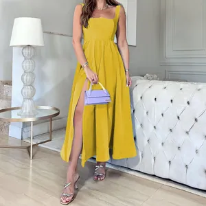 Model wearing a stylish yellow mid-length suspender dress for summer fashion