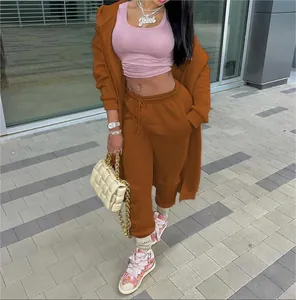 Full body view of a women's brown hooded sweatshirt and matching jogger pants set.