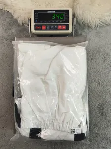 Actual product weight of 340g for this white cotton linen halter neck sleeveless dress