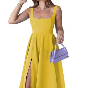 Stylish yellow solid color mid-length sundress with side slit detail shown on a model