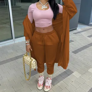 Full-body view of women's terracotta casual two-piece long hoodie and sweatpants set