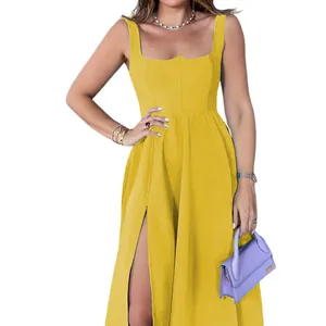 Front view detail of a yellow midi dress with square neck and high side slit design