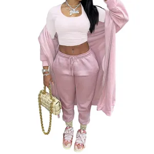 Women's pink long hooded sweatshirt and matching sweatpants sports two-piece set