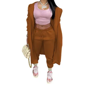 Stylish women's brown long hooded sweatshirt and matching jogger pants two-piece set