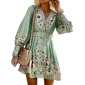 Detailed view of bohemian sage green floral print long sleeve V-neck dress with belt