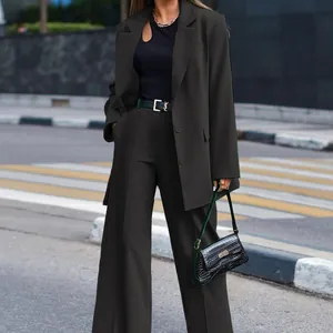 Full view of an elegant black long sleeve blazer and wide-leg trousers suit set