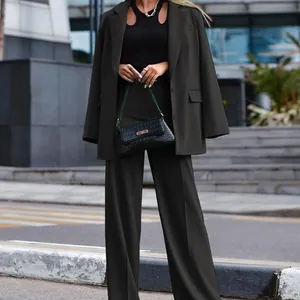 Chic women's oversized blazer and wide-leg pants two-piece suit for autumn street style