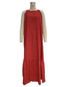 Full-length view of a vibrant red sleeveless halter maxi beach dress on a mannequin
