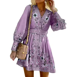 Bohemian purple floral print mini dress with elegant V-neck and long puff sleeves.