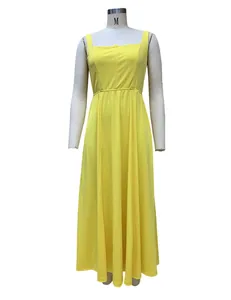 Detailed front view of a solid yellow sleeveless maxi dress on a display mannequin