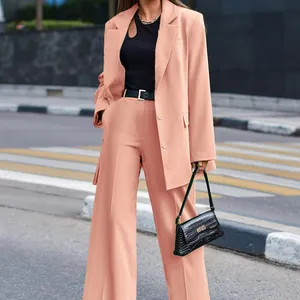 Elegant peach two-piece casual blazer and wide-leg trousers street style set for women