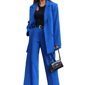 Detailed visual of a women's royal blue oversized blazer and matching wide-leg trousers suit