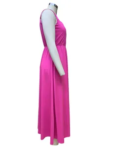 Side view of a vibrant pink midi sundress on a mannequin featuring elegant waist seam detail.