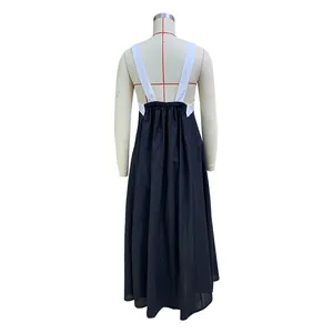 Back view detail of sleeveless black and white halter maxi dress in soft cotton linen