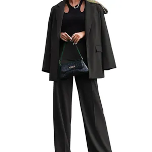 Elegant black two-piece suit with oversized blazer and wide-leg trousers for women