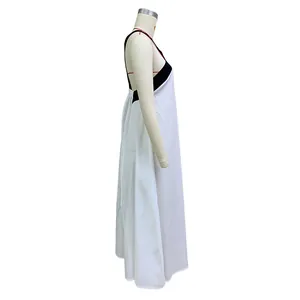 Side view of a white cotton linen halter maxi dress with black straps on a mannequin.