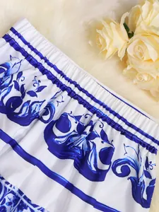 Close-up detail of the elastic waistband on a blue and white floral Mediterranean skirt