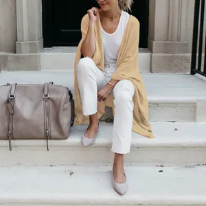 Loose irregular hem knit cardigan in beige for autumn and winter outdoor style