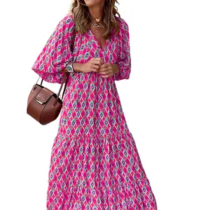 Vestido largo bohemio con estampado geométrico rosa, cuello en V y mangas abullonadas