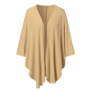 Full view of the loose knitted cardigan showing the draped irregular hem in beige tone