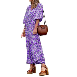 Vestido largo boho con estampado geométrico morado, escote en V y mangas abullonadas