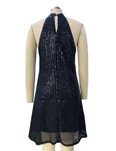 Back view of black halter neck sequined dress with teardrop cutout on a mannequin