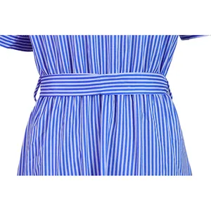 Detailed view of the waist and matching striped belt on a blue striped midi dress