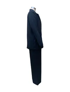 Detailed side view of a women's solid black long-sleeve casual blazer and pants set