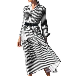 Detail view of black and white striped long sleeve V-neck midi dress with belt