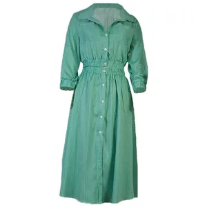 Front view of green vertical striped long sleeve shirt and midi skirt set