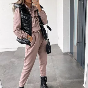 Casual mauve women's two-piece tracksuit set with hoodie and sweatpants.