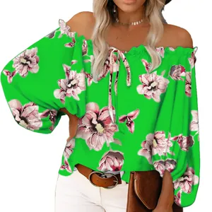 Close-up detail of a vibrant green off-the-shoulder floral blouse for women's fashion