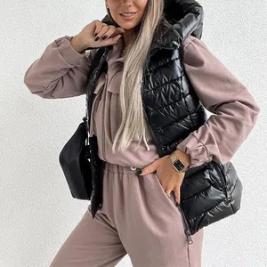 Fashionable two-piece mauve sports set featuring loose joggers and a matching hoodie detail