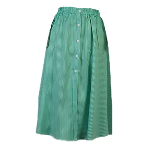 Close-up detail of a green and white vertical striped A-line skirt with white buttons
