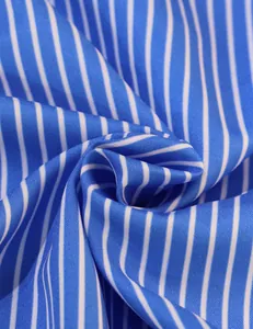 Macro detail of blue and white striped fabric texture from a stylish shirt set