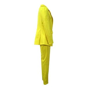 Side profile view of a vibrant yellow long-sleeve blazer and matching trouser suit set.