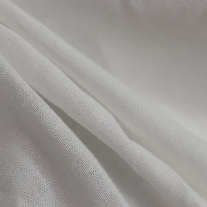 Macro view of high-quality white cotton linen fabric texture with natural weave