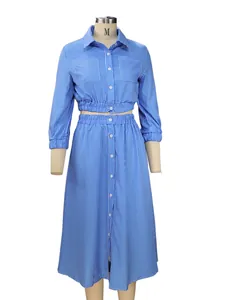 Detailed front view of blue and white striped long-sleeve shirt and midi skirt set