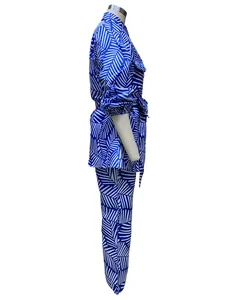 Detailed side profile of a stylish blue and white palm leaf printed shirt and pant set