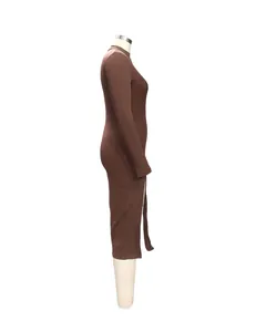 Side view detail of a brown ribbed long-sleeve bodycon dress with high neck and side slits