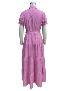 Back view of pink striped midi dress with short sleeves and tiered skirt details