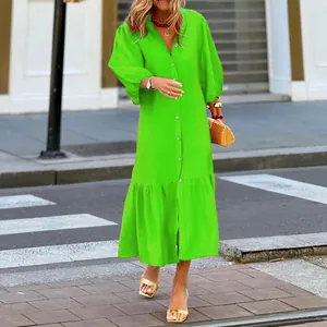 Vibrant neon green button-down midi dress featuring stylish balloon sleeves for summer