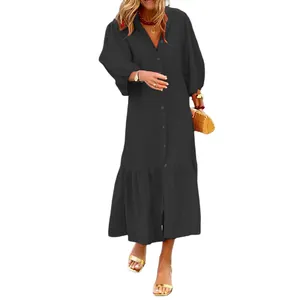 Elegant black puff sleeve button-down midi dress featuring a relaxed holiday style
