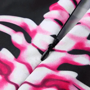 Close-up of the durable black invisible zipper on a pink skeleton pattern Halloween jumpsuit